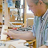 Tommy Nunn works on an instrument