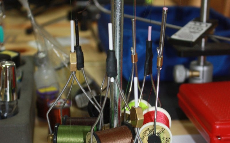 Thread materials used to make fish fly hooks.