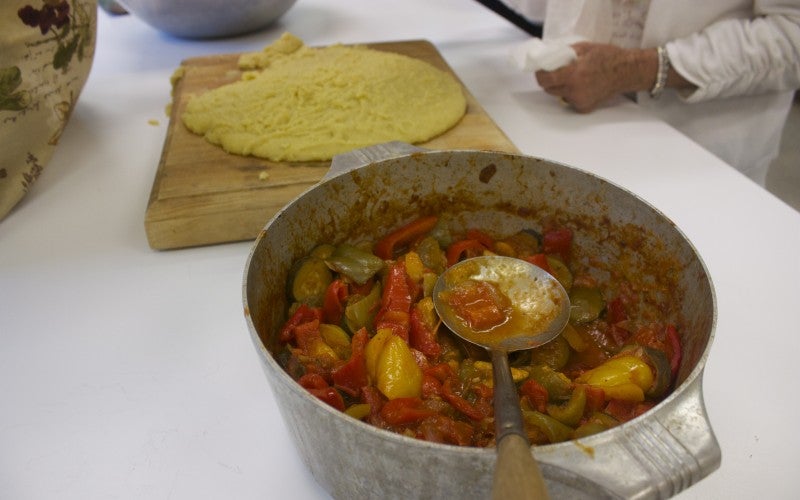 A traditional italian dish in a metal pot
