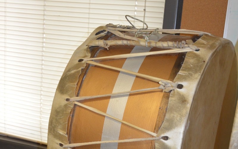 A double-sided tan drum sat on a table.