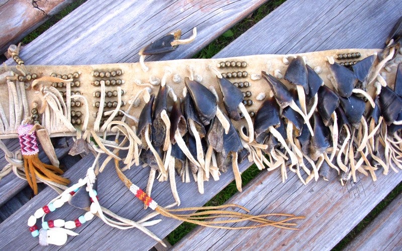 A traditional item decorated with deer hooves.