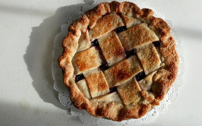 A homemade pie with a latticed crust