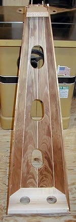 A stringed portion of a wooden instrument