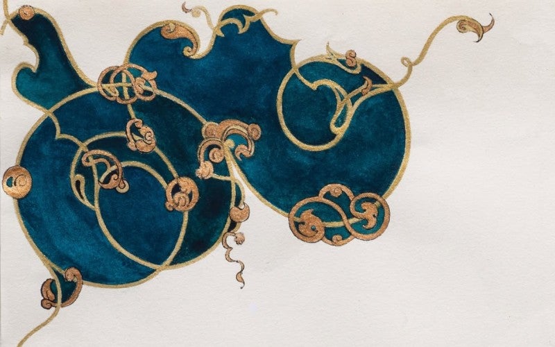 close-up view of intricate teal blue, gold, and bronze design.