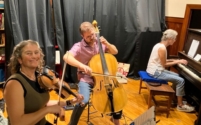 Picture of Shari Ame with a trio of musicians; a contra dance band called the Errant Whistlers, with friends from Portland and Vancouver. 