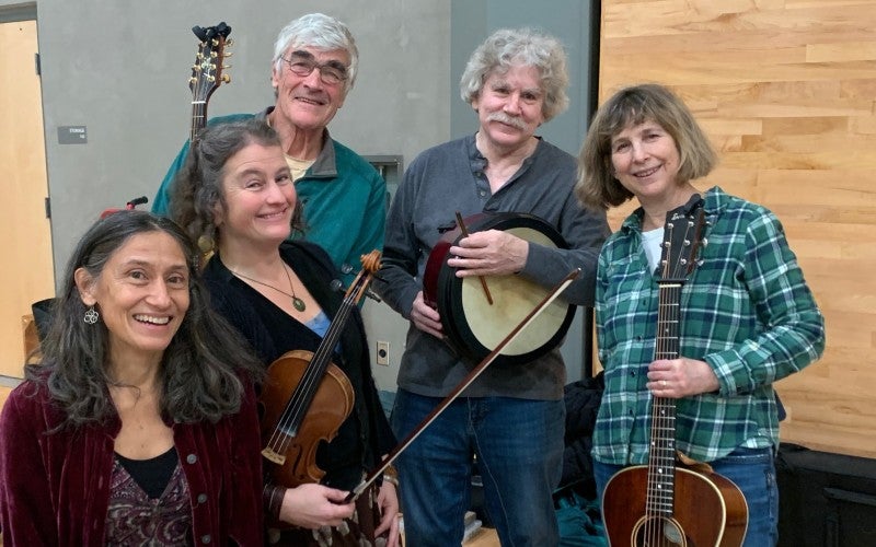Shari Ame with her quintet, a Corvallis-based contra dance band, The Overtones.