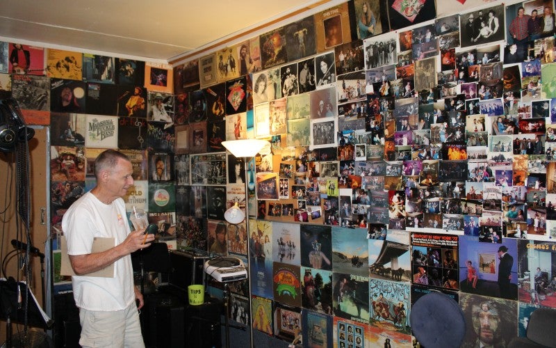 Member of the Huckleberrys talking in a studio