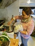 Ang Diki Sherpa in the process of cooking the momo dumplings